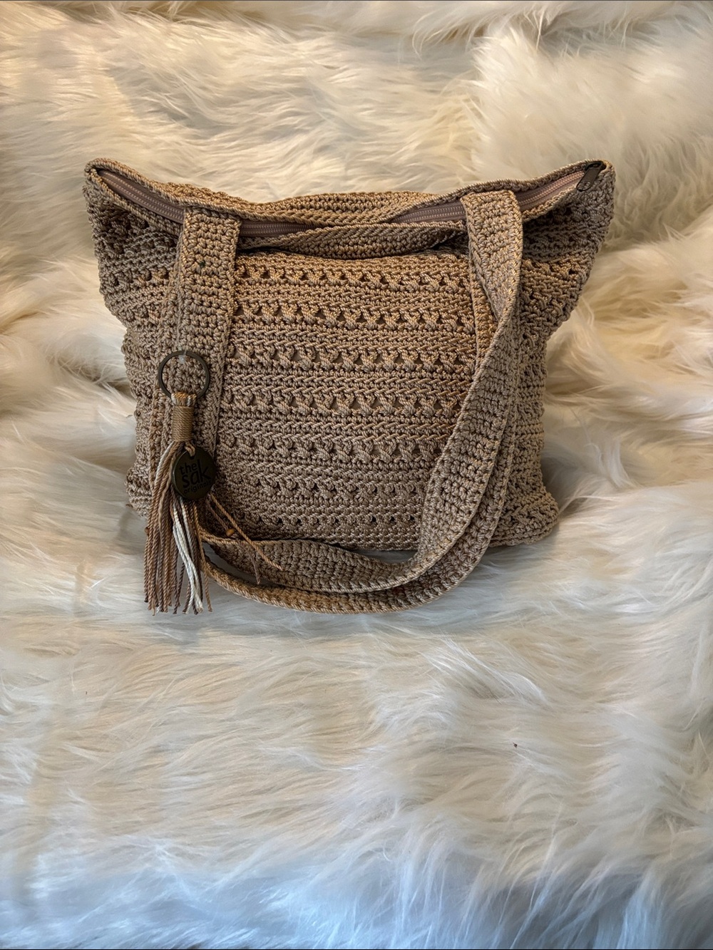 The Sak originals Crochet Tote with Tassel Charm